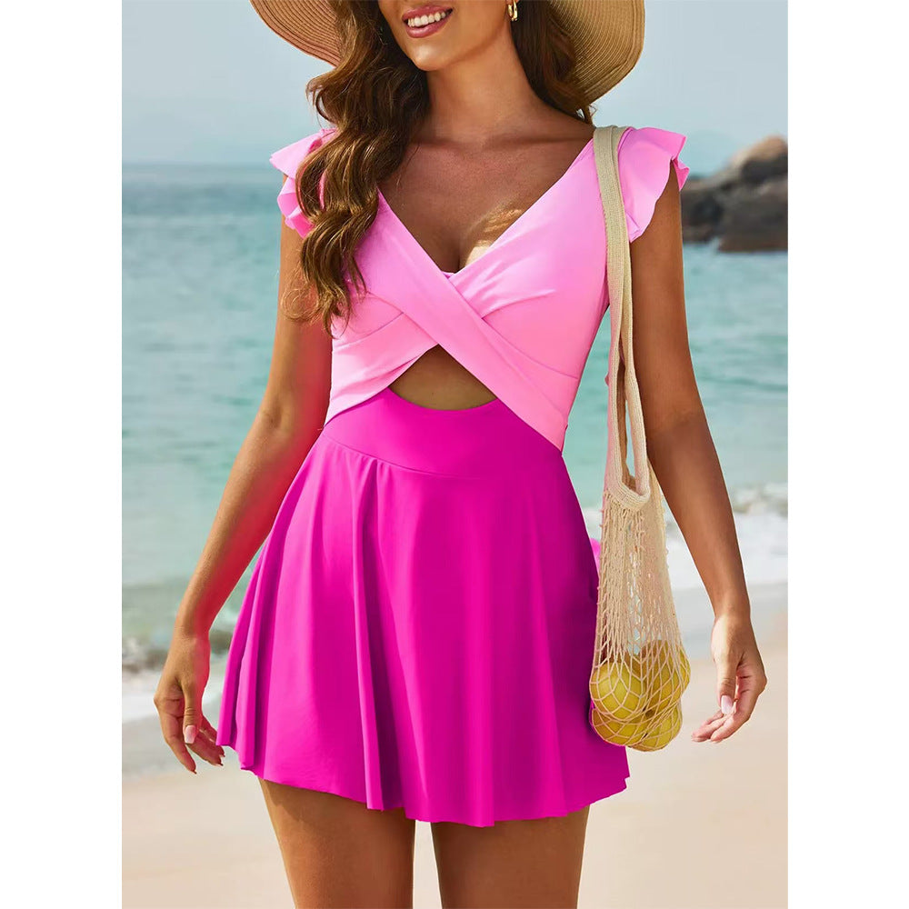 One-piece swimming suit with frilled cross-shaped skirt design