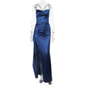 A pleated satin dress with a long skirt