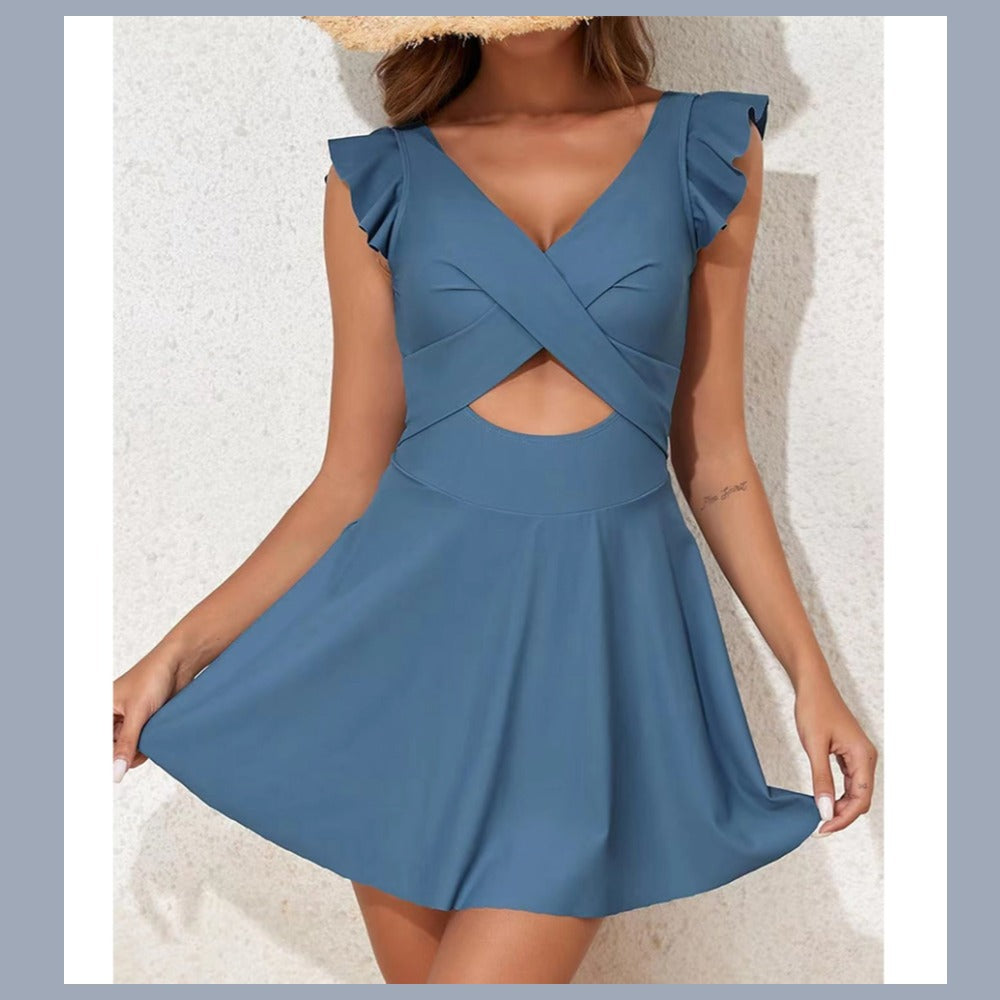 One-piece swimming suit with frilled cross-shaped skirt design