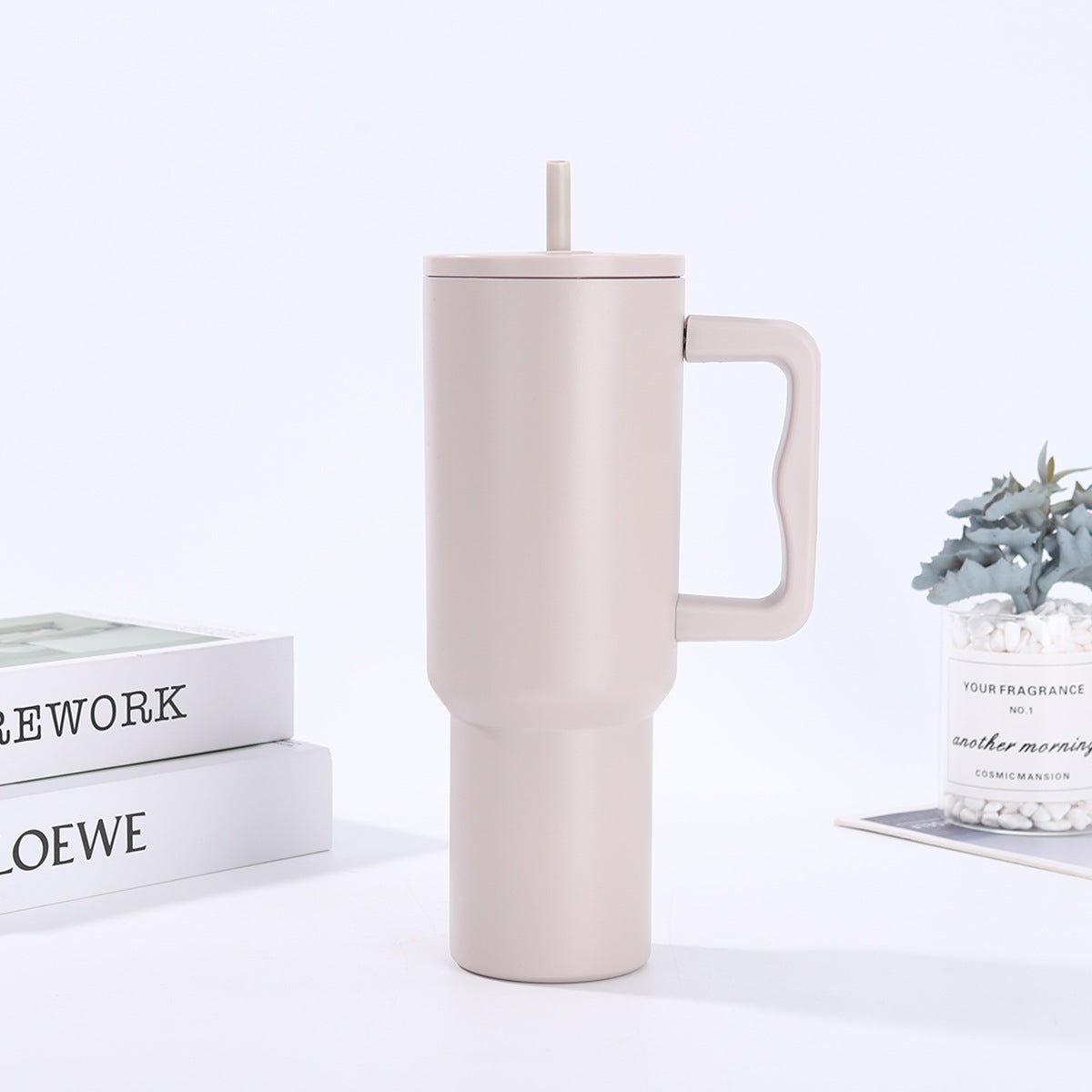 Handle-equipped insulated cup