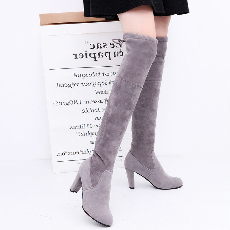 Above-knee boots with high heels