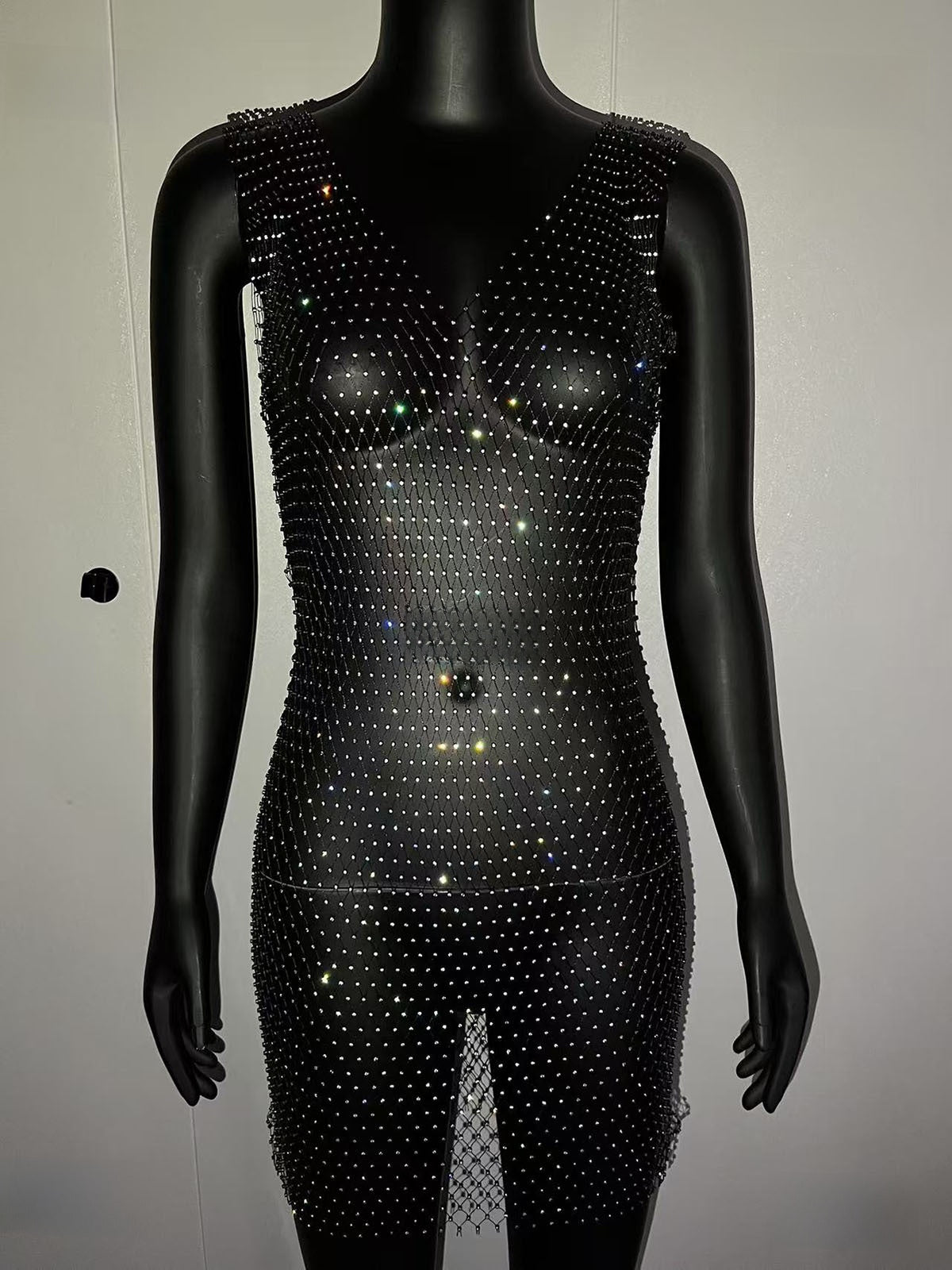 V-neck dress with a cut-out fishing net mini skirt