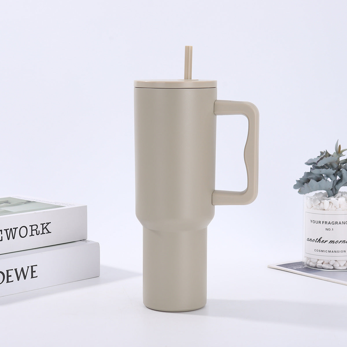 Handle-equipped insulated cup